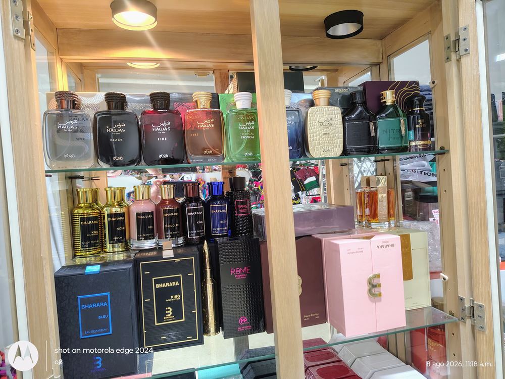 Fragrance display shelf at Liz Fashion, featuring Arabian and designer-inspired perfumes